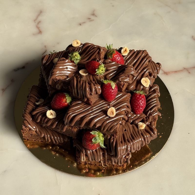 Chocolate cake with strawberries and hazelnuts