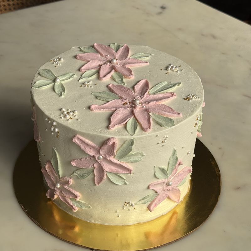 Buttercream cake piped with flowers